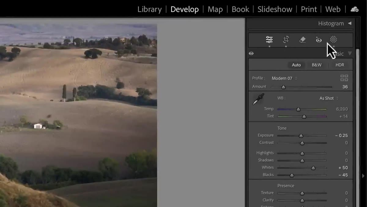 Lightroom Classic toolbar showing the eraser icon above the Basic panel