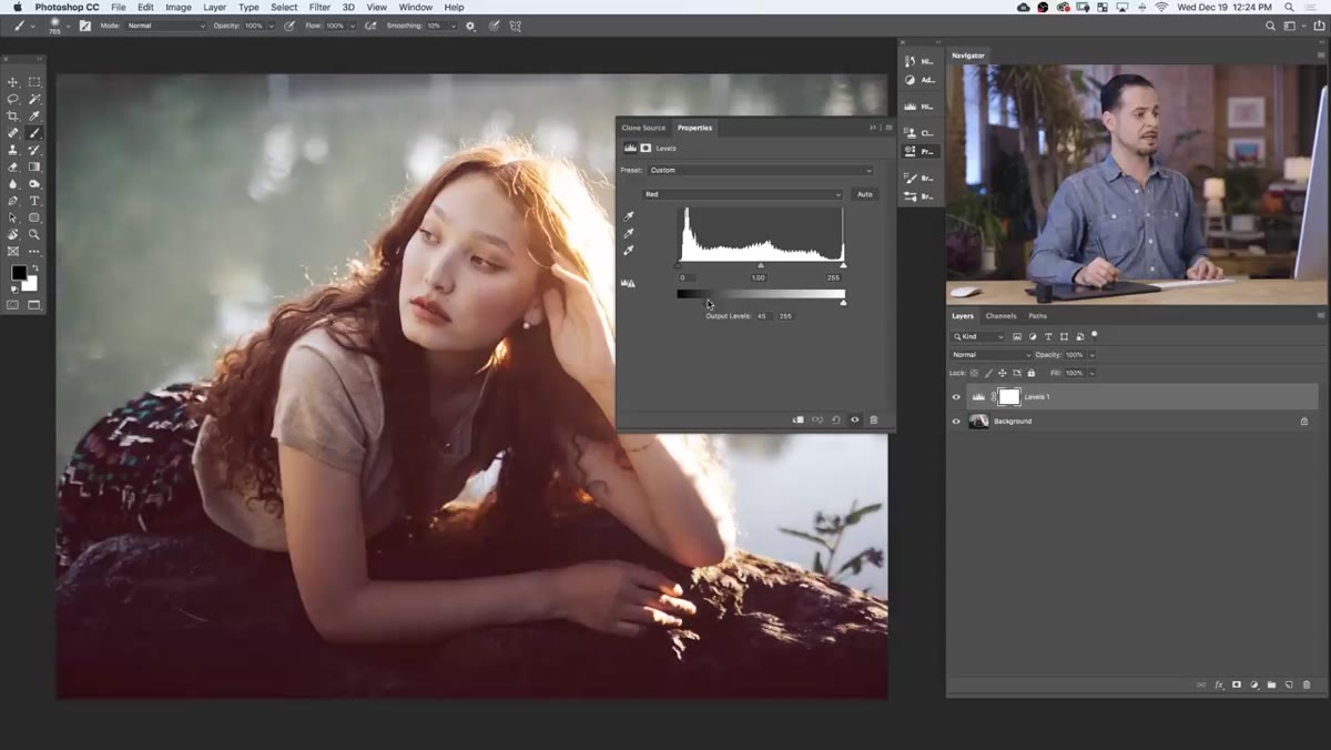 Red channel output level shadow slider being adjusted in Levels
