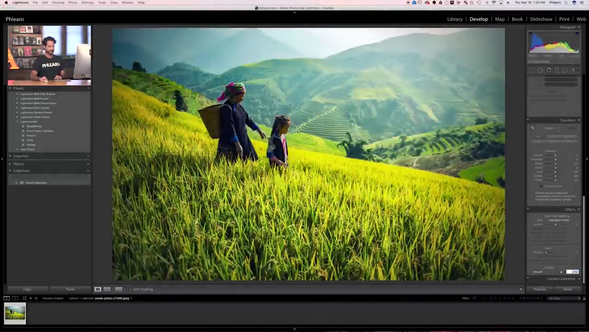 Dehaze slider being dragged right, background clearing in photo