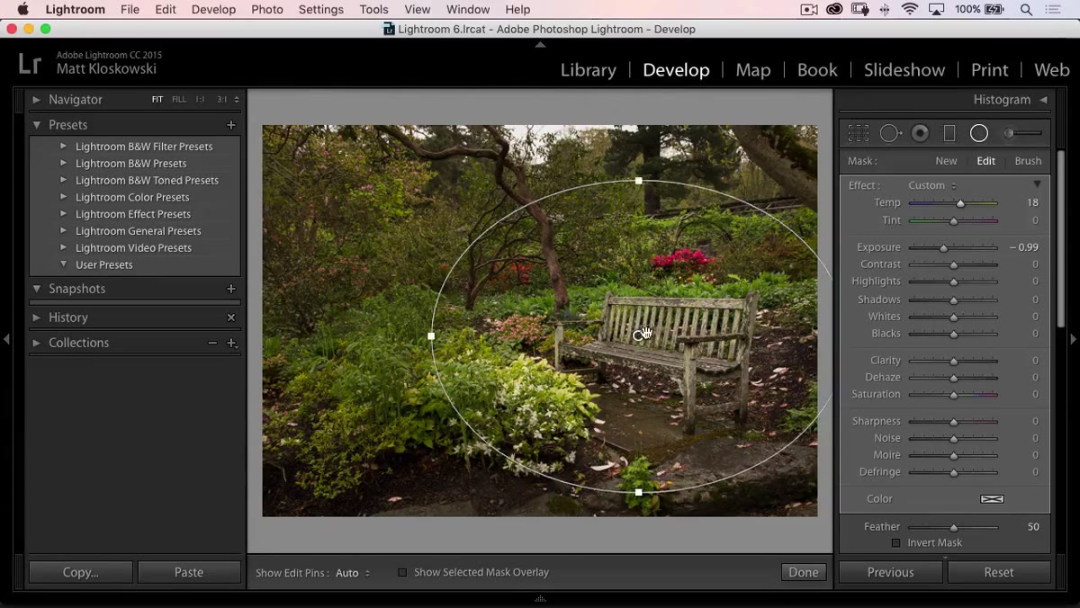 Photoshop open with a lens flare overlay being placed on the image