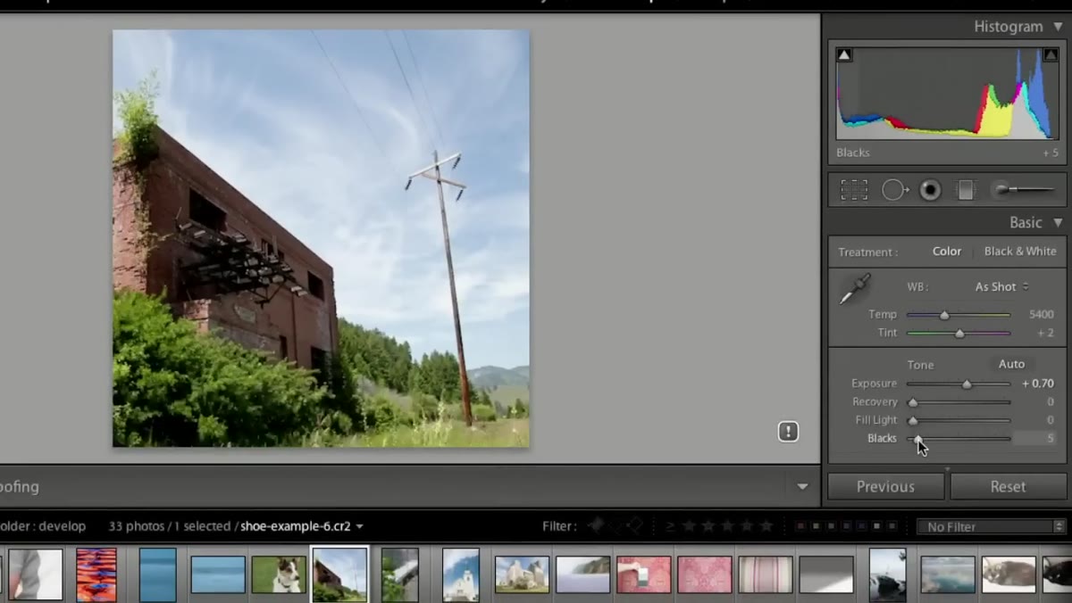 Blacks slider being pulled back to recover shadow detail