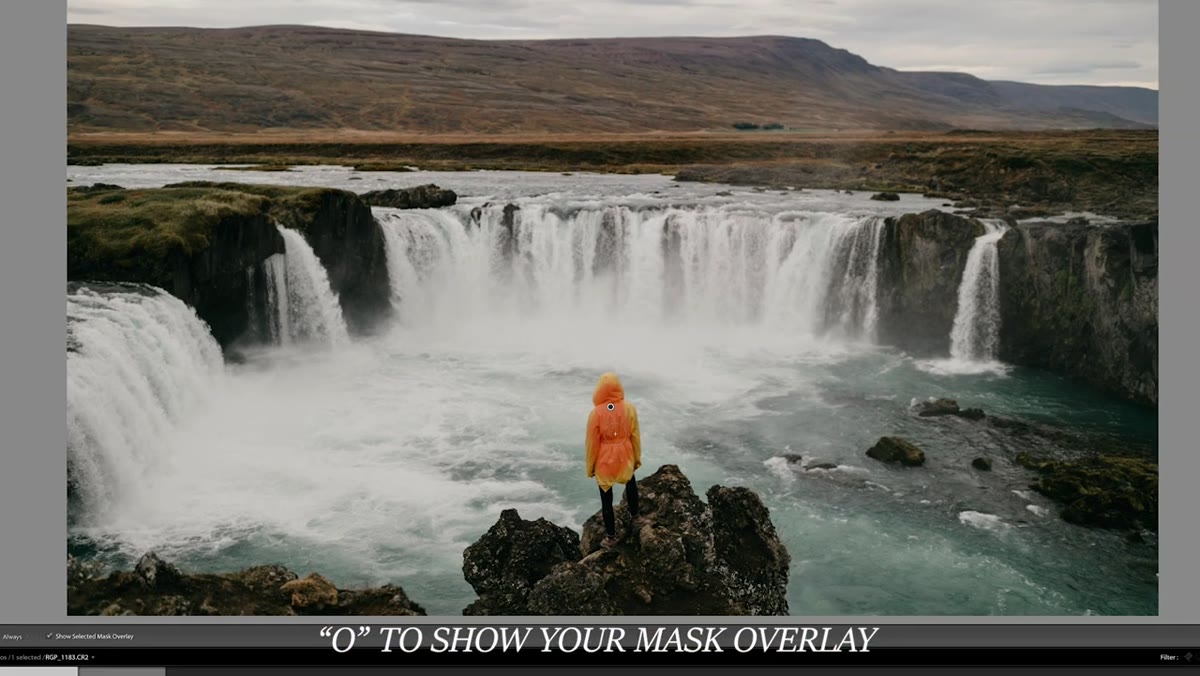 Red mask overlay painted across subject&rsquo;s jacket
