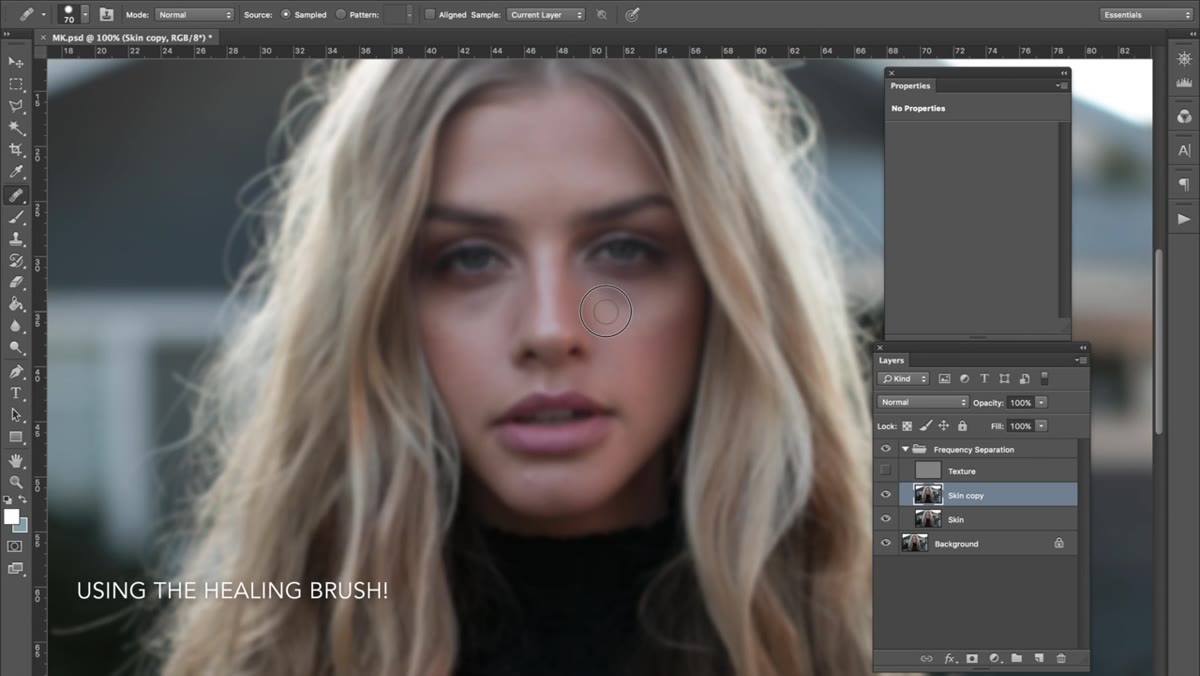 Clone stamp sampling skin tone on the low-frequency layer