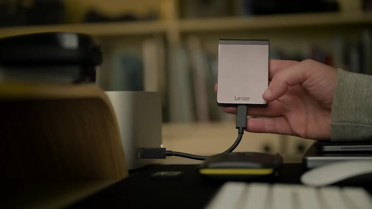 Lexar SSD shown next to SD and CFexpress cards on a desk