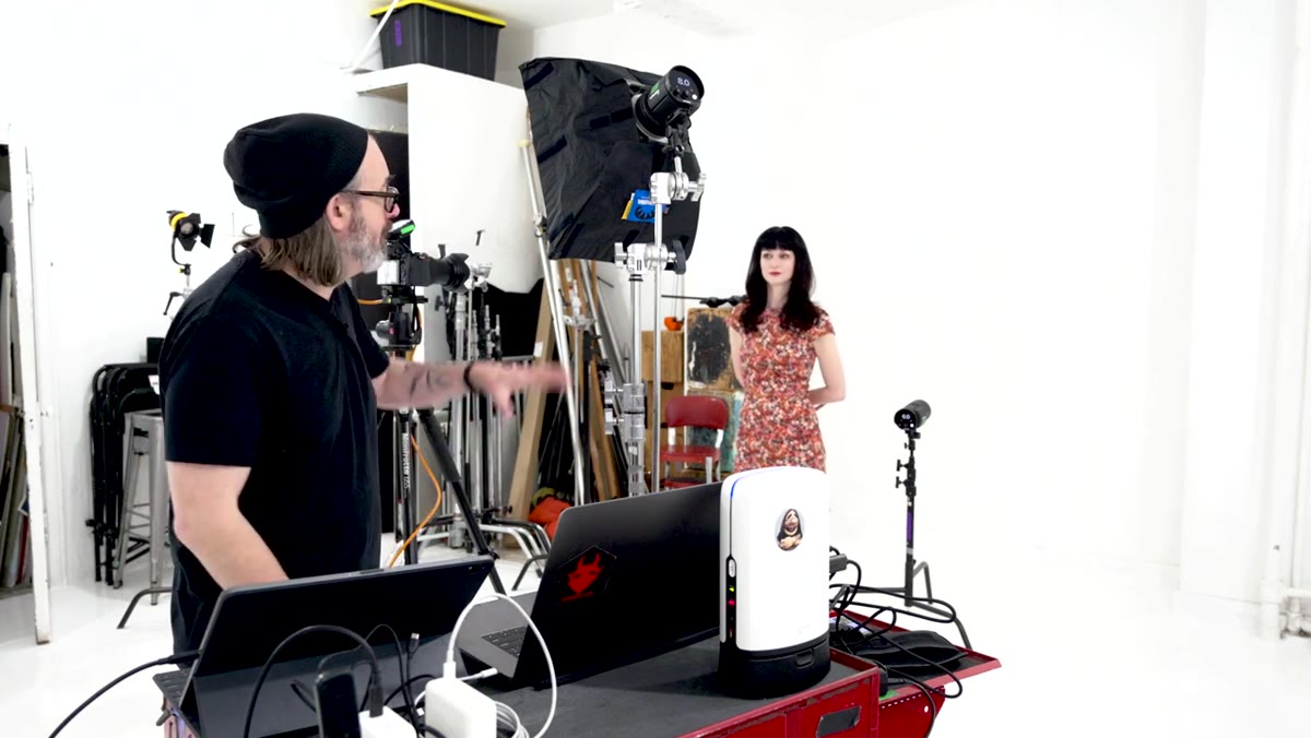 Studio setup showing softbox and background light positioned separately