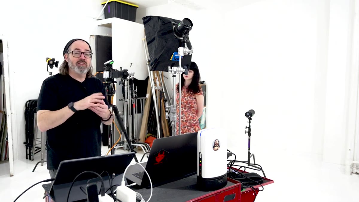 CTO gel being placed over studio strobe head