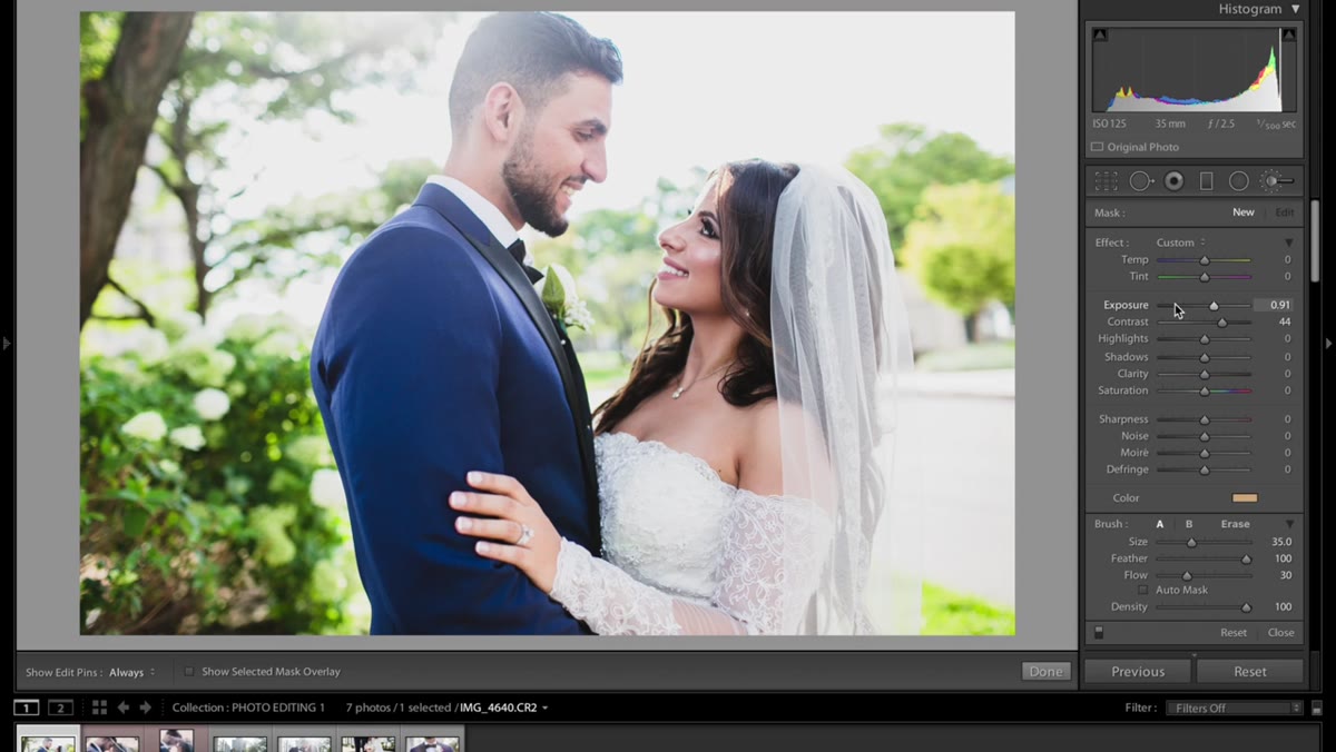 Adjustment brush applied off-face with orange color tint selected