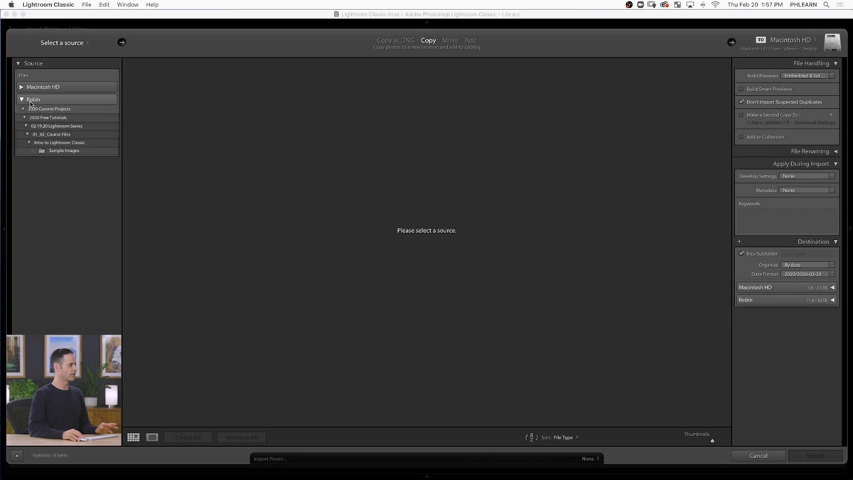 File explorer dragging a photo folder into Lightroom